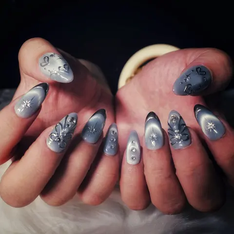 Ongles amande gris, effet cat-eye